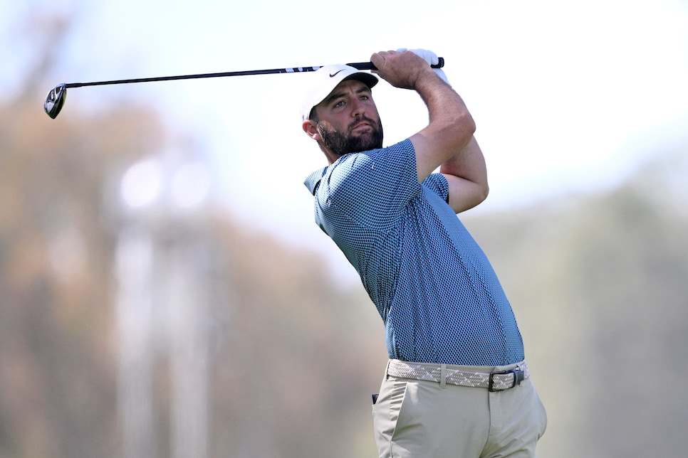 PACIFIC PALISADES, CALIFORNIA - FEBRUARY 22: Scottie Scheffler of the United States plays a shot on the 11th hole during the final round of The Genesis Invitational 2026 at Riviera Country Club on February 22, 2026 in Pacific Palisades, California. (Photo by Orlando Ramirez/Getty Images)